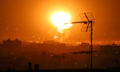 Tehran fuel dumps burn as Iran warns it can fight for months