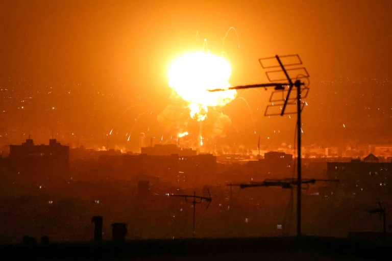 Tehran fuel dumps burn as Iran warns it can fight for months